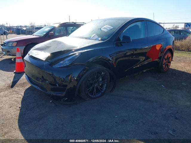 2024 TESLA MODEL Y 7SAYGDED3RF128476 Photo 1