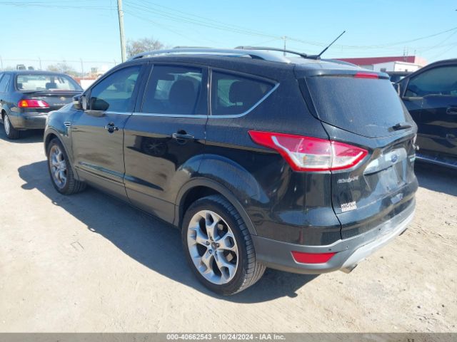 1FMCU0J97EUA81718 Ford Escape Titanium