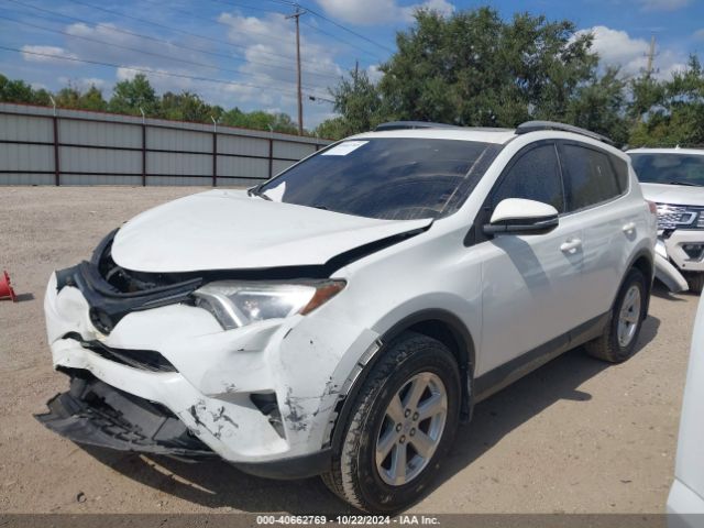 JTMWFREV1JJ733588 Toyota Rav4 Xle
