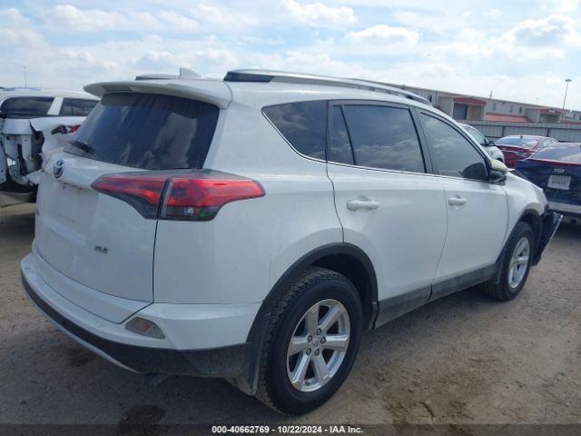 JTMWFREV1JJ733588 Toyota Rav4 Xle