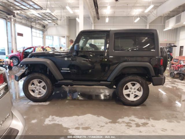 1C4AJWAG1FL682975 Jeep Wrangler Sport
