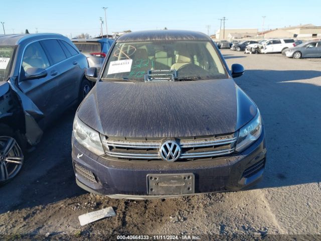 WVGAV3AX9EW044291 Volkswagen TIGUAN SE