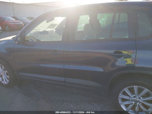 WVGAV3AX9EW044291 Volkswagen TIGUAN SE