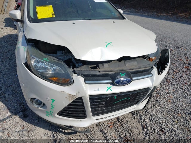 Продажа на аукционе авто 2013 Ford Focus Titanium, vin: 1FADP3J24DL200162, номер лота: 40664384