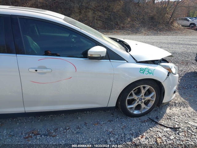 Продажа на аукционе авто 2013 Ford Focus Titanium, vin: 1FADP3J24DL200162, номер лота: 40664384