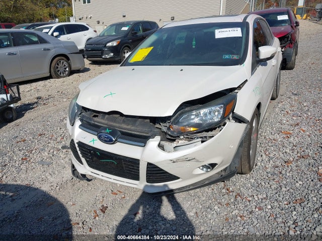 Продажа на аукционе авто 2013 Ford Focus Titanium, vin: 1FADP3J24DL200162, номер лота: 40664384