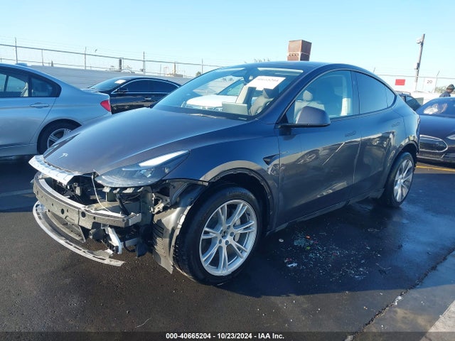2023 TESLA MODEL Y 7SAYGDEE4PF927673 Photo 1