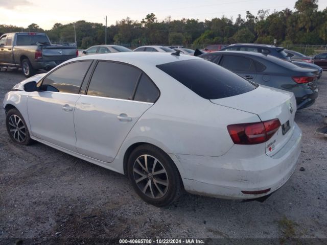 3VWDB7AJ9JM254605 Volkswagen Jetta 1.4t Se/1.4t Wolfsburg Edition