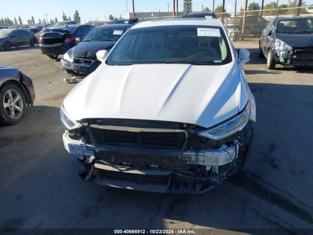 3FA6P0MUXKR265598 Ford Fusion Hybrid Sel