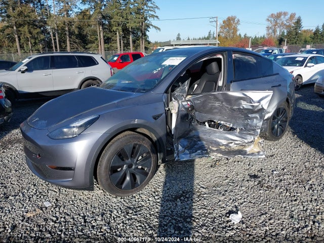2024 TESLA MODEL Y 7SAYGDEE1RF200705 Photo 1