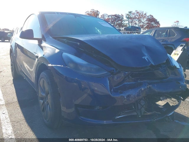 2024 TESLA MODEL Y 7SAYGDEE7RA307142 Photo 0