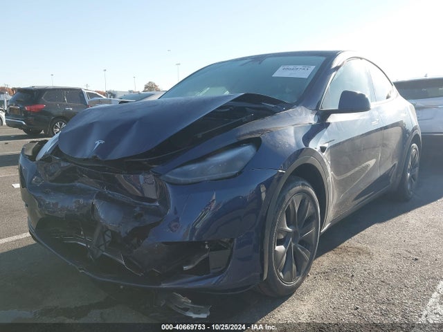 2024 TESLA MODEL Y 7SAYGDEE7RA307142 Photo 1