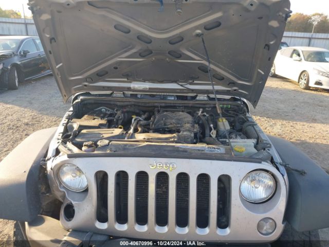 1C4BJWDG0GL124813 Jeep Wrangler Unlimited Sport