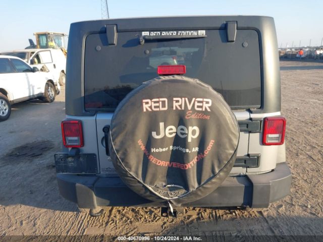 1C4BJWDG0GL124813 Jeep Wrangler Unlimited Sport