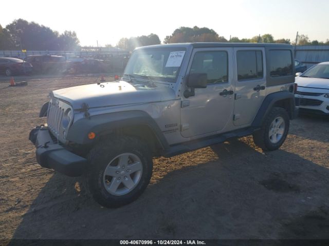 1C4BJWDG0GL124813 Jeep Wrangler Unlimited Sport