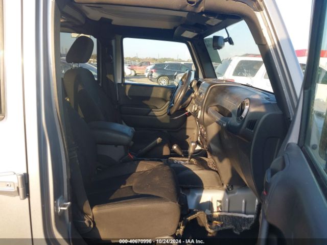 1C4BJWDG0GL124813 Jeep Wrangler Unlimited Sport