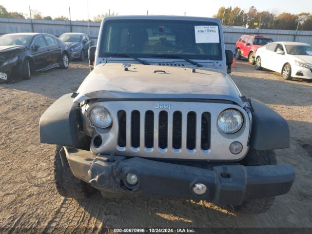 1C4BJWDG0GL124813 Jeep Wrangler Unlimited Sport