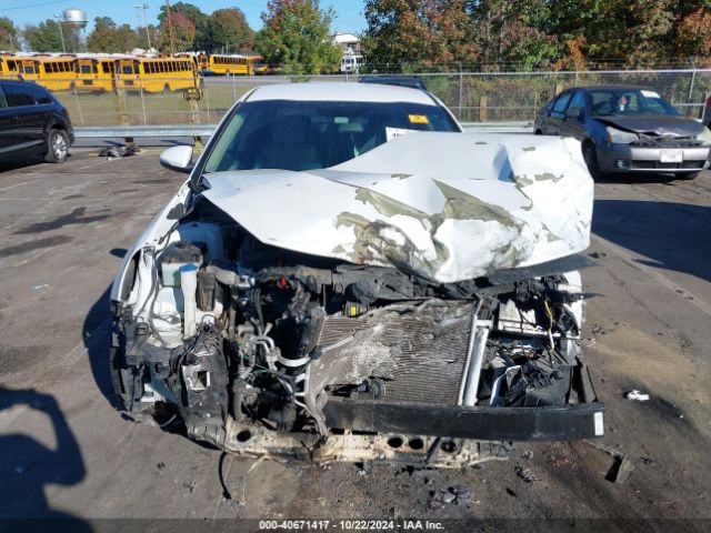 5XXGT4L3XGG005749 KIA Optima Lx