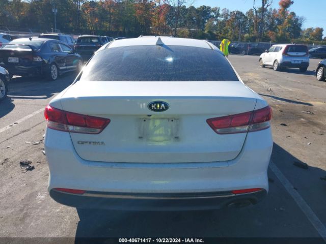 5XXGT4L3XGG005749 KIA Optima Lx