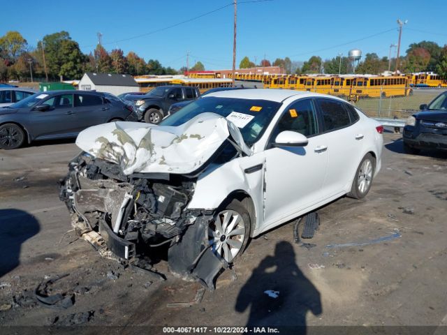 5XXGT4L3XGG005749 KIA Optima Lx