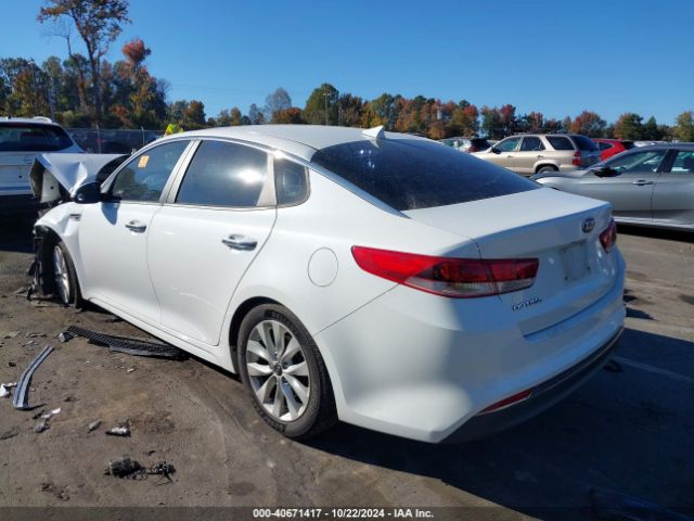 5XXGT4L3XGG005749 KIA Optima Lx
