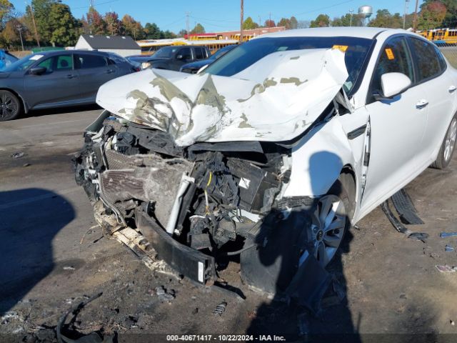 5XXGT4L3XGG005749 KIA Optima Lx