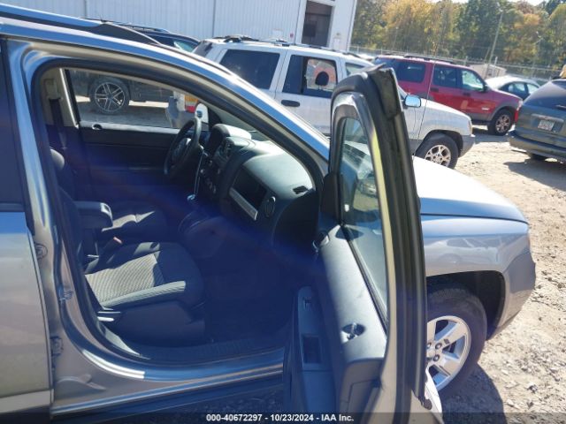 1C4NJCBA5ED844481 Jeep Compass Sport