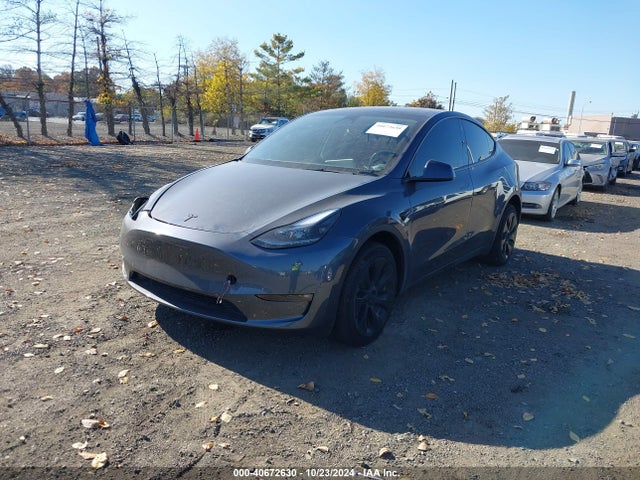 2023 TESLA MODEL Y 7SAYGDEE0PF756369 Photo 1