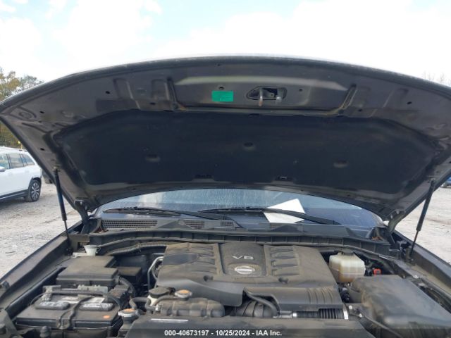 JN8AY2ND7JX001289 Nissan Armada Sl