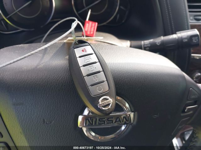 JN8AY2ND7JX001289 Nissan Armada Sl