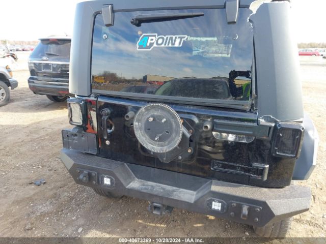 1C4BJWDG8GL106429 Jeep Wrangler Unlimited Sport