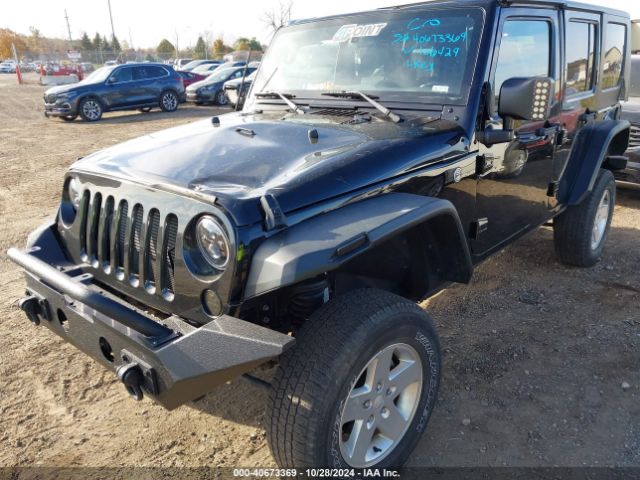 1C4BJWDG8GL106429 Jeep Wrangler Unlimited Sport