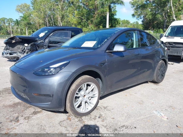 2023 TESLA MODEL Y 7SAYGDED2PF947136 Photo 1