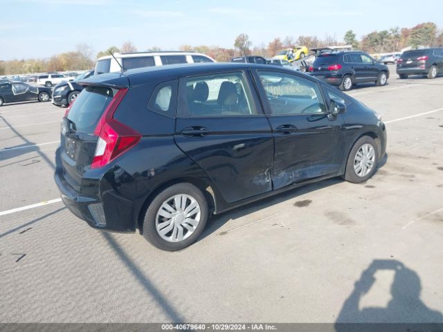 JHMGK5H50GX006516 Honda FIT LX