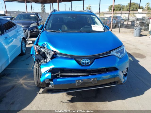 JTMRJREV4HD134611 Toyota Rav4 Hybrid Xle