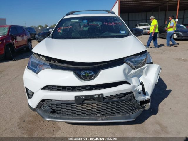 JTMNFREV2GD086539 Toyota RAV4 SE