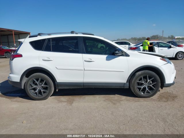 JTMNFREV2GD086539 Toyota RAV4 SE