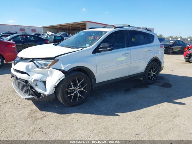 JTMNFREV2GD086539 Toyota RAV4 SE