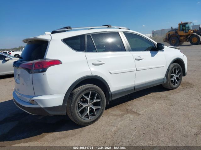 JTMNFREV2GD086539 Toyota RAV4 SE