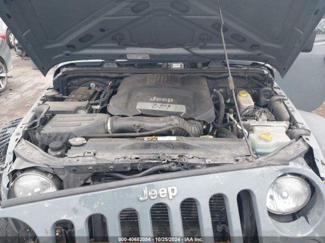 1C4BJWDG0EL313121 Jeep Wrangler Unlimited Sport