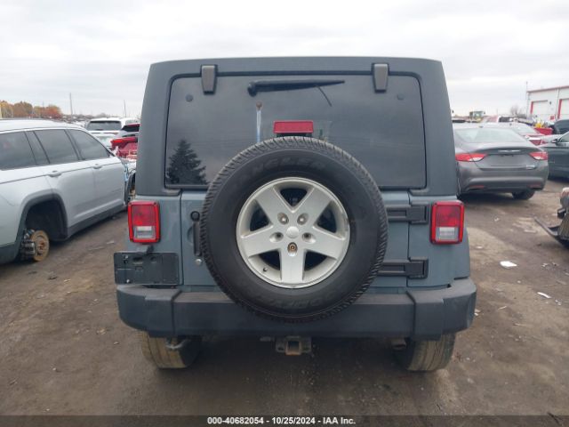 1C4BJWDG0EL313121 Jeep Wrangler Unlimited Sport