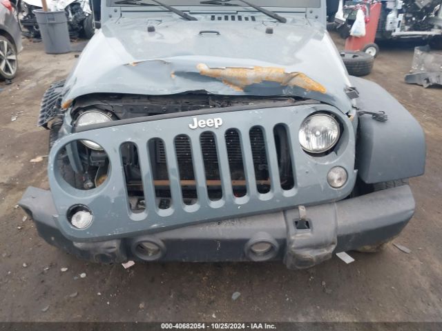 1C4BJWDG0EL313121 Jeep Wrangler Unlimited Sport
