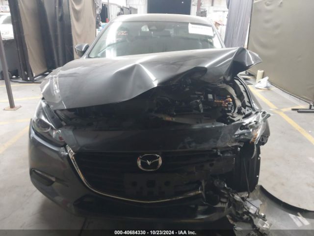 3MZBN1L31JM251501 Mazda Mazda3 Touring
