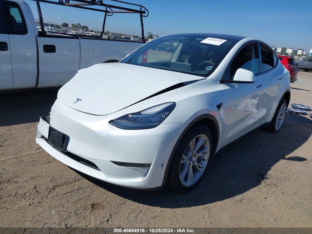 2023 TESLA MODEL Y 7SAYGDEE2PA043549 Photo 1