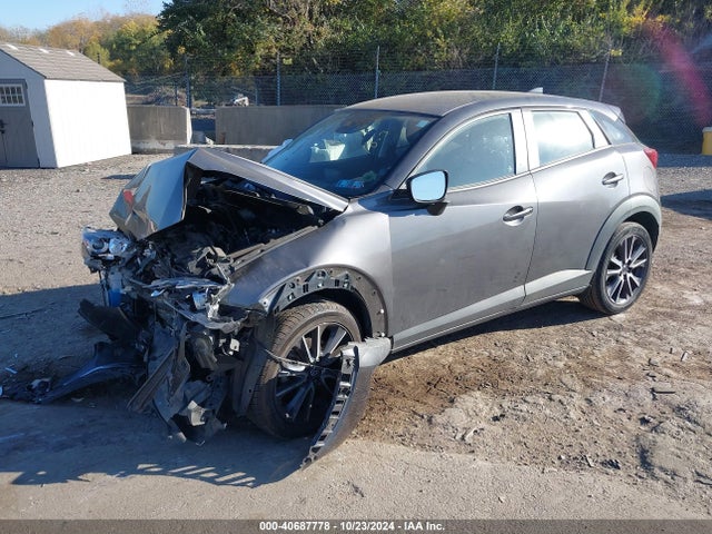JM1DKFC76J0319072 Mazda Cx-3 Touring