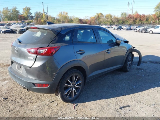 JM1DKFC76J0319072 Mazda Cx-3 Touring