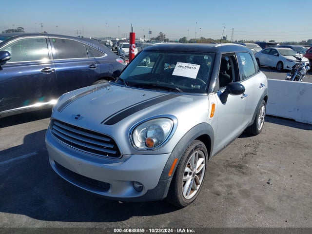 2011 MINI COOPER COUNTRYMAN WMWZB3C5XBWM00932 Photo 1