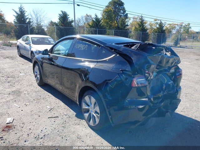 2023 TESLA MODEL Y 7SAYGAEE2PF612921 Photo 2