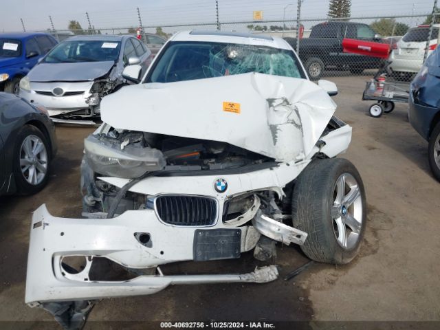 WBA3B1C5XEP679811 BMW 320i