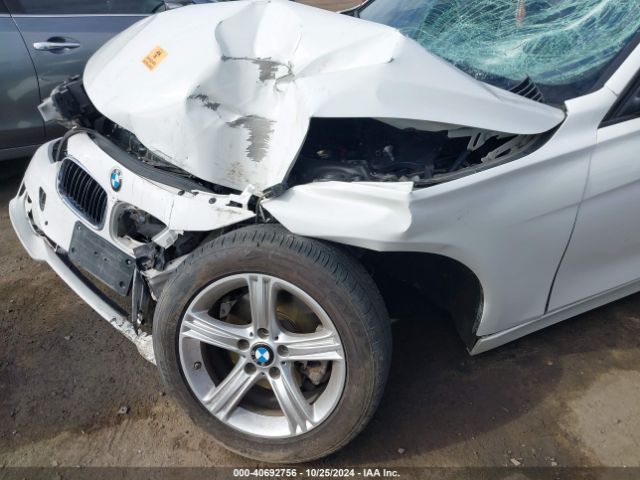 WBA3B1C5XEP679811 BMW 320i
